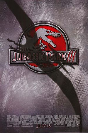 Film poster with a logo at center of a skeleton of a Spinosaurus, with its mouth wide open and hands lifted up. The logo's background is red, and right below it is the film's title. A shadow covers a large portion of the film poster in the shape of a flying Pteranodon. At the bottom of the image are the credits and release date.